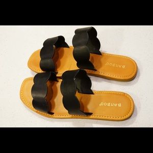 Black scalloped sandal